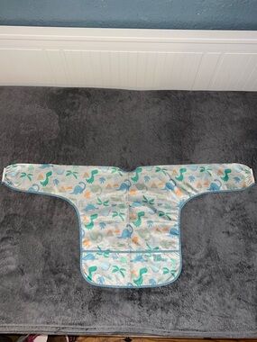 BumKins Blue & Green Dino Sleeved Bib with Orange Accents